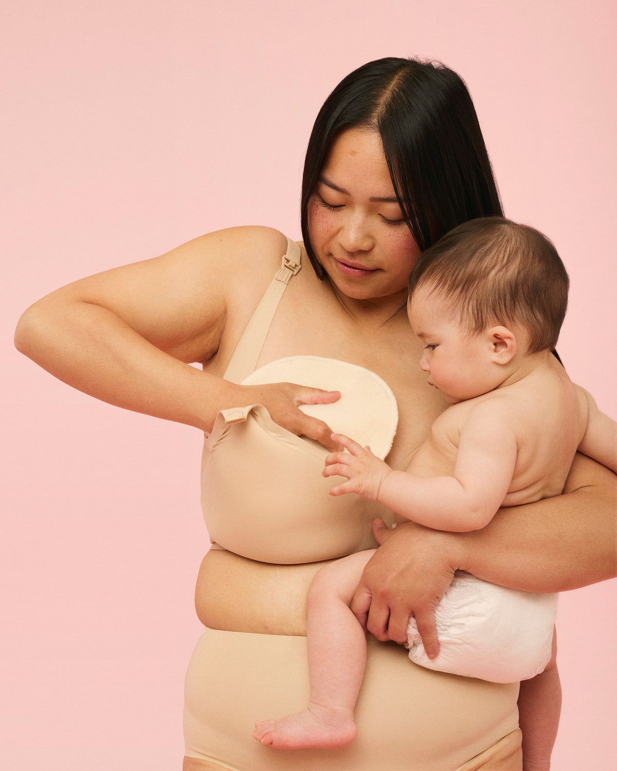momkind ammeindlæg af uld placeres i amme bh med vattering 